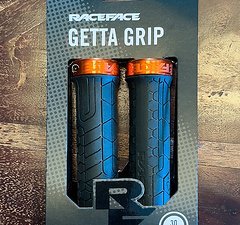 Race Face Getta Grip schwarz/orange 30mm