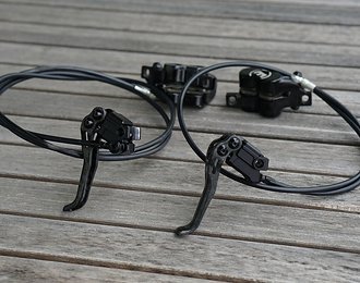 Foto von Trickstuff Trigura Piccola HD Carbon Stealth LTD mit viel Zubehör